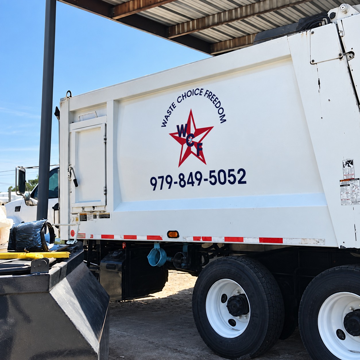 Waste Choice Freedom collection truck with company branding